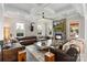 Spacious living room with coffered ceiling, fireplace, and comfortable seating area at 9611 Pensive Ln, Waxhaw, NC 28173