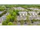 An aerial view showing a neighborhood with tree-lined streets at 1001 Woodglen Ln, Matthews, NC 28104