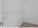 Walk-in closet with carpeted floor and wire shelving for storage at 1001 Woodglen Ln, Matthews, NC 28104