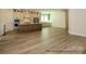Spacious kitchen with a center island, stainless steel appliances, and custom cabinetry at 1003 Idyllic Ln, Waxhaw, NC 28173