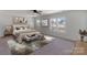 Cozy bedroom featuring a comfortable queen-sized bed, soft carpet, and multiple windows at 1041 Secor St, Statesville, NC 28677