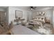 Beautifully staged bedroom with neutral tones, a ceiling fan, and stylish furnishings at 1041 Secor St, Statesville, NC 28677