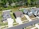 The house is located in a lovely neighborhood featuring manicured lawns and mature trees at 1045 Cavalier Ln, Rock Hill, SC 29730