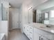 Modern bathroom featuring double sinks, large vanity, tile floor, and glass shower at 1045 Cavalier Ln, Rock Hill, SC 29730