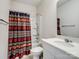 Bathroom featuring a shower with a patterned curtain and a vanity with a white countertop at 1045 Cavalier Ln, Rock Hill, SC 29730