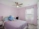 Bedroom featuring a bed, desk, and window with natural light and ceiling fan at 1045 Cavalier Ln, Rock Hill, SC 29730