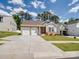 Charming home boasts a two-car garage, well-maintained lawn, and attractive landscaping for curb appeal at 1045 Cavalier Ln, Rock Hill, SC 29730