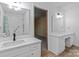 Bathroom with a separate vanity area and bright lighting at 1074 Oakridge Farm Hwy, Mooresville, NC 28115