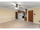 Open-concept living and dining area leading to a cozy kitchen at 1074 Oakridge Farm Hwy, Mooresville, NC 28115