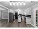 Spacious kitchen with white cabinets and stainless steel appliances at 1106 University Dr, Lancaster, SC 29720