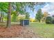 Storage shed provides ample space for tools and equipment on this oversized lot at 1106 University Dr, Lancaster, SC 29720