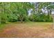 An expansive, grassy backyard offers ample space for outdoor activities and leisure at 1116 Montgomery Ave, Albemarle, NC 28001