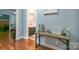 Hallway showcasing a peek of a bathroom with a vanity and a peek of a bedroom at 1116 Montgomery Ave, Albemarle, NC 28001