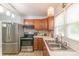 Updated kitchen with stainless steel appliances, view of large sink, and lots of counter space at 1116 Montgomery Ave, Albemarle, NC 28001