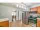 Bright and airy kitchen with stainless steel appliances and attached breakfast nook at 1116 Montgomery Ave, Albemarle, NC 28001