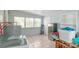Spacious laundry room with a washer, dryer, and ample room for storage at 1116 Montgomery Ave, Albemarle, NC 28001