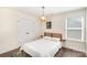 Bright bedroom with a patterned area rug, and a ceiling fan at 1124 Culver Spring Way, Charlotte, NC 28215