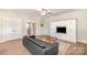 Comfortable living room with built-in entertainment center, stylish furniture, and inviting atmosphere at 1124 Culver Spring Way, Charlotte, NC 28215
