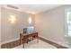 Bright office with a modern desk and a window allowing for natural light at 1124 Culver Spring Way, Charlotte, NC 28215