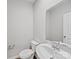 Powder room with modern fixtures, neutral color palette, and stylish design at 113 Fosters Glen Pl, Mooresville, NC 28115