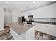 Modern kitchen with granite countertops and stainless steel appliances at 113 Fosters Glen Pl, Mooresville, NC 28115
