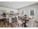 Eat-in kitchen with modern appliances and dining table at 113 Fosters Glen Pl, Mooresville, NC 28115