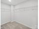 This is a walk-in closet with wire shelving and plush carpet at 113 Fosters Glen Pl, Mooresville, NC 28115
