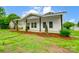 Cozy bungalow home featuring a covered porch and refreshed curb appeal at 113 Woodside Ave, Gastonia, NC 28054