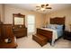 Comfortable bedroom featuring a window letting in natural light and a ceiling fan at 115 Stumpy Creek Rd, Mooresville, NC 28117
