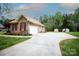 Long driveway leads to a two-car garage, providing ample parking and storage space at 115 Stumpy Creek Rd, Mooresville, NC 28117