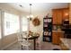 Eat-in kitchen with bright light, breakfast table and generous storage space at 115 Stumpy Creek Rd, Mooresville, NC 28117