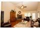 Comfortable living room with hardwood floors, a fireplace, and plenty of seating, great for entertaining guests at 115 Stumpy Creek Rd, Mooresville, NC 28117