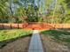 Inviting backyard featuring a charming wood deck, perfect for outdoor relaxation and entertainment at 1177 Ellis Pond Dr, Rock Hill, SC 29730