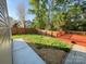 The spacious backyard features a wooden deck and a wood privacy fence at 1177 Ellis Pond Dr, Rock Hill, SC 29730