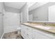 Bathroom with double sink vanity, granite countertops, neutral tiling, and shower-tub combo at 1177 Ellis Pond Dr, Rock Hill, SC 29730