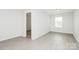 Inviting bedroom with neutral walls, laminate flooring, and natural light at 1177 Ellis Pond Dr, Rock Hill, SC 29730