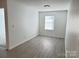 Bright bedroom featuring modern flooring and neutral walls at 1177 Ellis Pond Dr, Rock Hill, SC 29730
