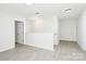 Bright open hallway with laminate flooring, leading to additional rooms at 1177 Ellis Pond Dr, Rock Hill, SC 29730