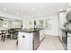 Stylish kitchen with stainless steel appliances, granite countertops, and a view into the dining area at 1177 Ellis Pond Dr, Rock Hill, SC 29730