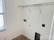 An efficiently-designed laundry room featuring connections and shelving for organization and ease at 1177 Ellis Pond Dr, Rock Hill, SC 29730