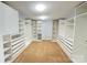 Large walk-in closet with custom organizers and ample storage space for clothes and accessories at 1177 Ellis Pond Dr, Rock Hill, SC 29730