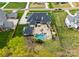 A beautiful home features a private backyard with a stunning pool, spa, and spacious patio perfect for entertaining at 129 Hunts Landing Dr, Mooresville, NC 28117