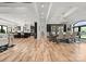 Large dining room showcasing hardwood floors and elegant chandelier at 129 Hunts Landing Dr, Mooresville, NC 28117