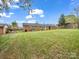 Large, grassy backyard with a fence, ideal for recreation and Gathering gatherings at 1309 Briarcliff Rd, Shelby, NC 28152