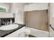 Bathroom showcasing a sink, toilet, and shower with coordinated fixtures and marbled countertops at 1309 Briarcliff Rd, Shelby, NC 28152