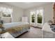 Bedroom featuring large windows with lace curtains, offering natural light and a cozy atmosphere at 1309 Briarcliff Rd, Shelby, NC 28152