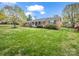 Brick ranch home with lush green lawn, mature landscaping, and charming front porch, great location at 1309 Briarcliff Rd, Shelby, NC 28152
