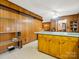 Eat-in kitchen area with vintage cabinets and decor, as well as seamless flow into the main living area at 1309 Briarcliff Rd, Shelby, NC 28152