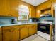 Well-lit kitchen with appliances, ample cabinetry, and vintage charm at 1309 Briarcliff Rd, Shelby, NC 28152