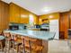 Charming kitchen with a breakfast bar, plenty of cabinet storage, and a vintage flair at 1309 Briarcliff Rd, Shelby, NC 28152